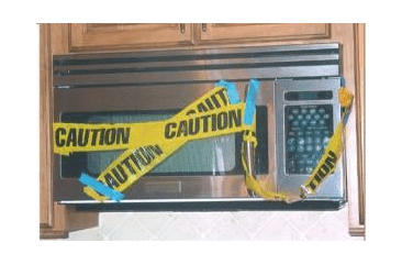 Microwave with caution tape