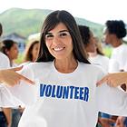 a volunteer woman smling for picture